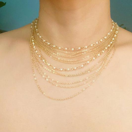 Beautifully Draping Pearl and Chain Necklace